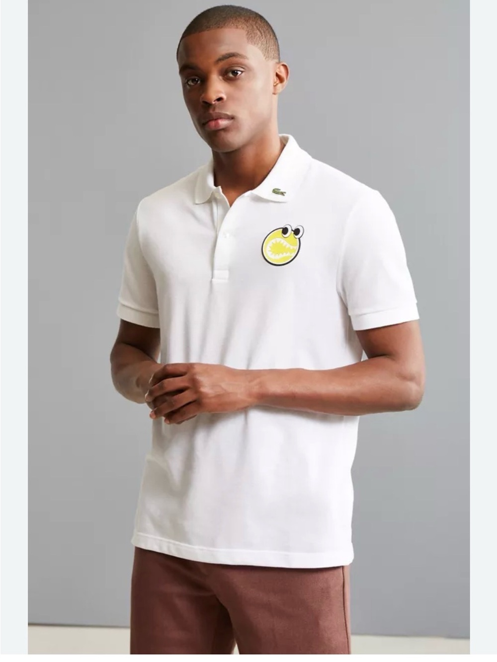 Lacoste White Polo with Yellow Graphic Patch